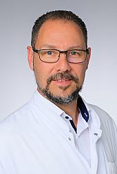 Dr. Dirk Schedler